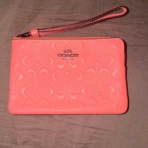 Coach Pink Embossed Wristlet